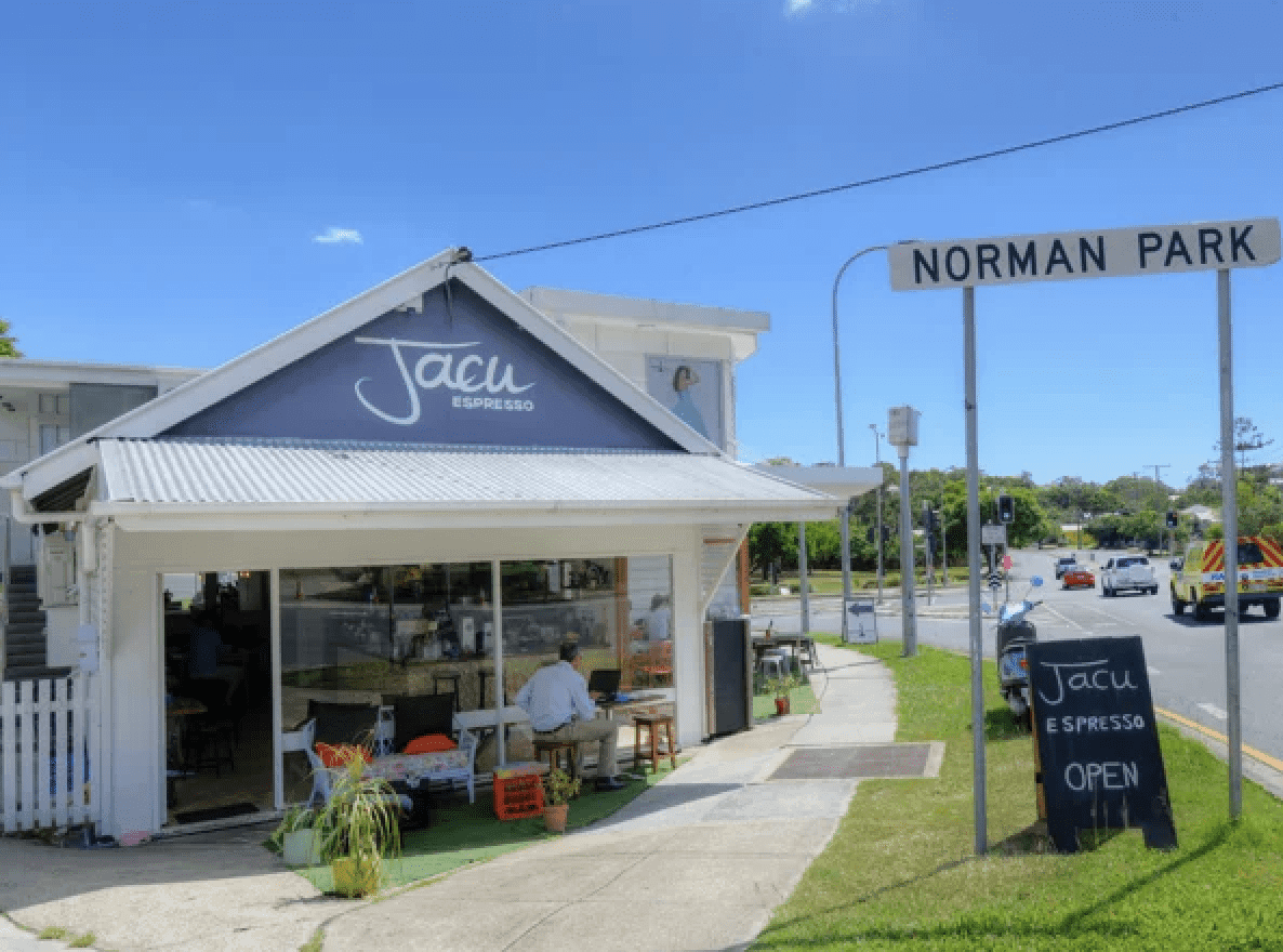 Norman Park Suburb Sign Next To Cafe